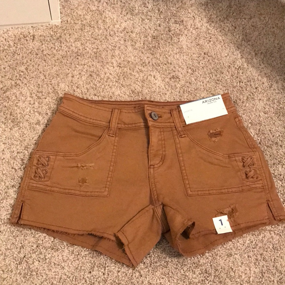 Brown distressed jean shorts